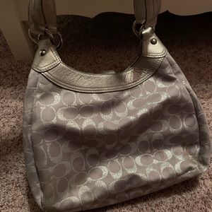 Authentic coach purse.  Few small stains pictured